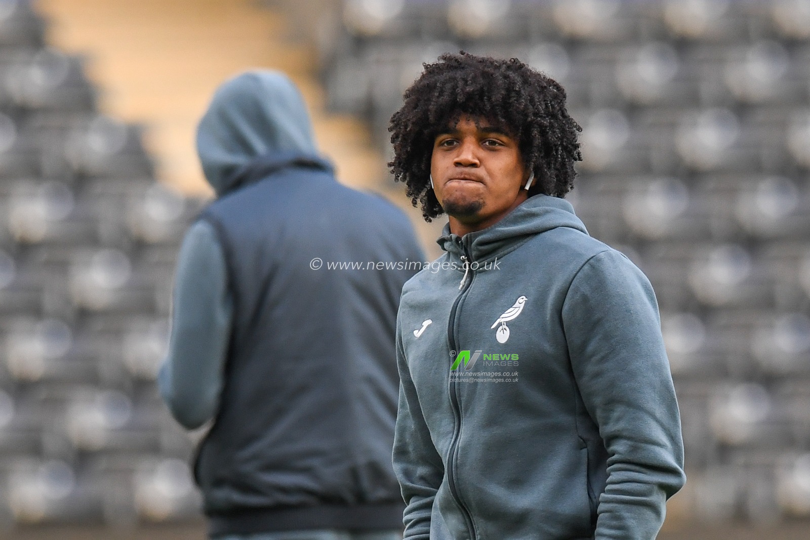 Sam McCallum #15 of Norwich City pre match pitch inspection during the Sky Bet Championship match Swansea City vs Norwich City at Swansea.com Stadium, Swansea, United Kingdom, 10th December 2022

(Photo by Mike Jones/News Images)