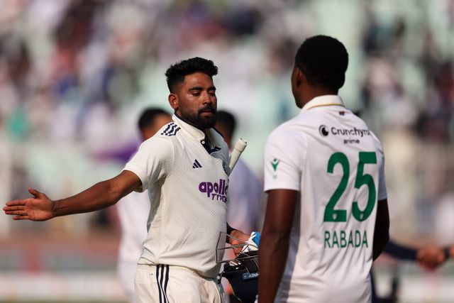 Mohammed Siraj of India with Kagiso Rabada of South Africa during the IDFC First Bank Test Day 3 match India vs South Africa at Eden Gardens, Kolkata, India, 16th November 2025

(Photo by Shubhajit Roy Karmakar/News Images)