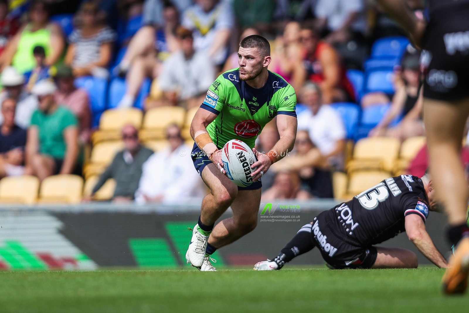Matt Dufty of Warrington Wolves passes the ball during the Betfred Super League Round 21 match London Broncos vs Warrington Wolves at Plough Lane, Wimbledon, United Kingdom, 11th August 2024

(Photo by Izzy Poles/News Images)