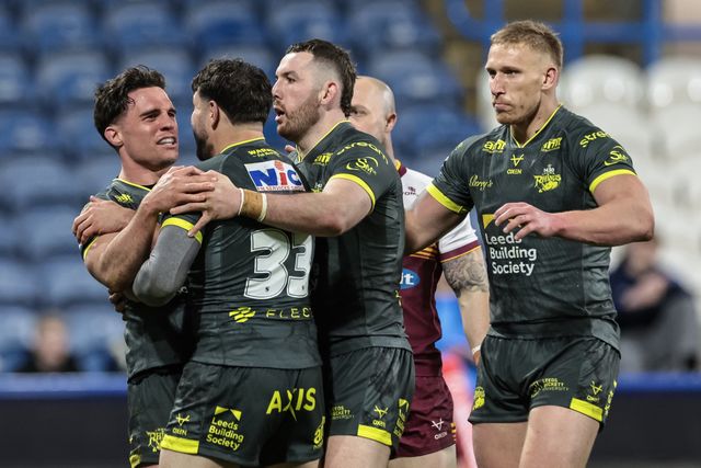 Brodie Croft of Leeds Rhinos celebrates his try with team mates during the Betfred Super League round 8 match Huddersfield Giants vs Leeds Rhinos at Accu Stadium, Huddersfield, United Kingdom on 17 April 2026

(Photo by Mark Cosgrove/News Images)
