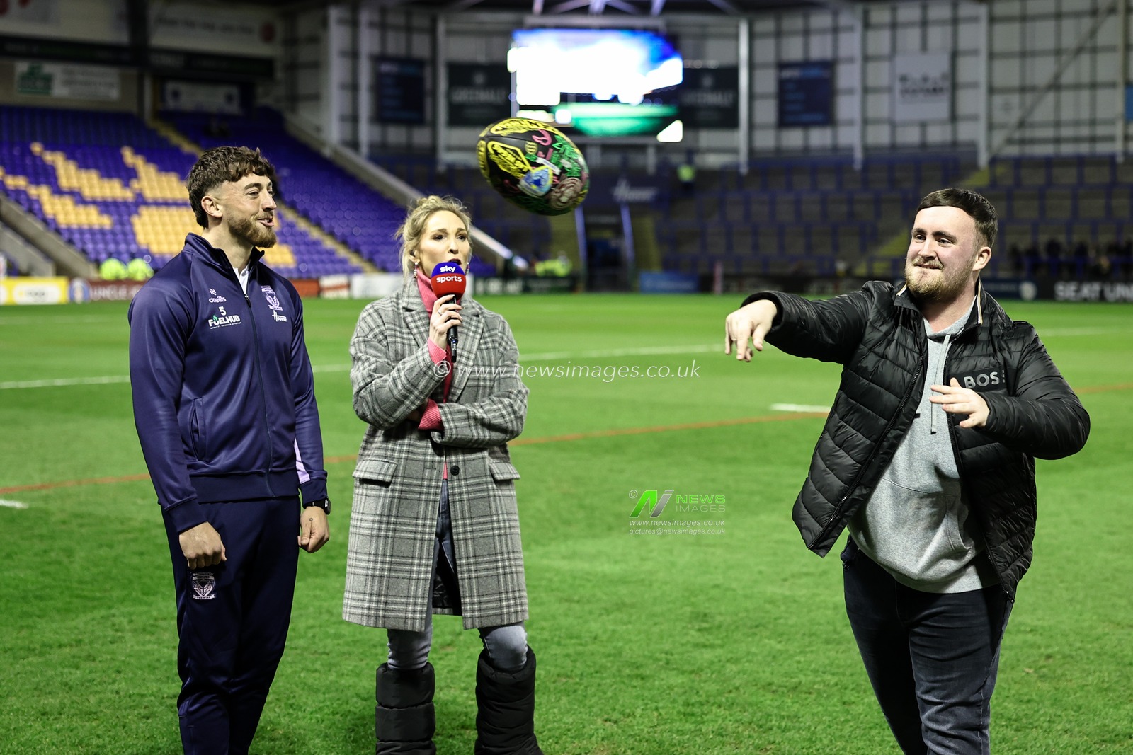 Luke Littler throws the Wigan Warriors and Warrington Wolves Steeden Las Vegas during the Betfred Super League Round 2 match Warrington Wolves vs Catalans Dragons at Luke Littler Stadium, Warrington, United Kingdom, 21st February 2025

(Photo by Mark Cosgrove/News Images)