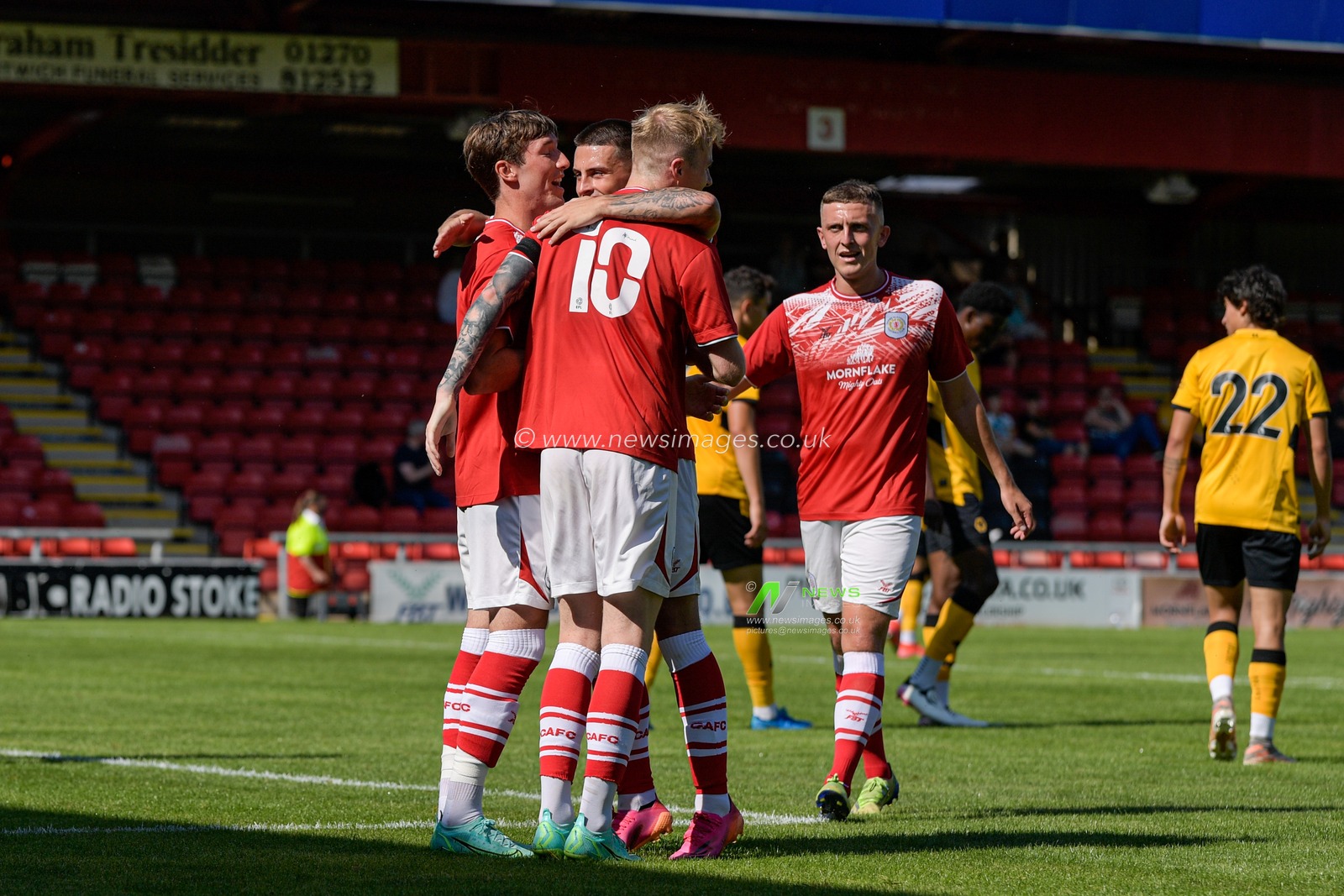 Christopher Long #9 of Crewe Alexandra celebrates scoring a goal with his team mates to make it 1-0