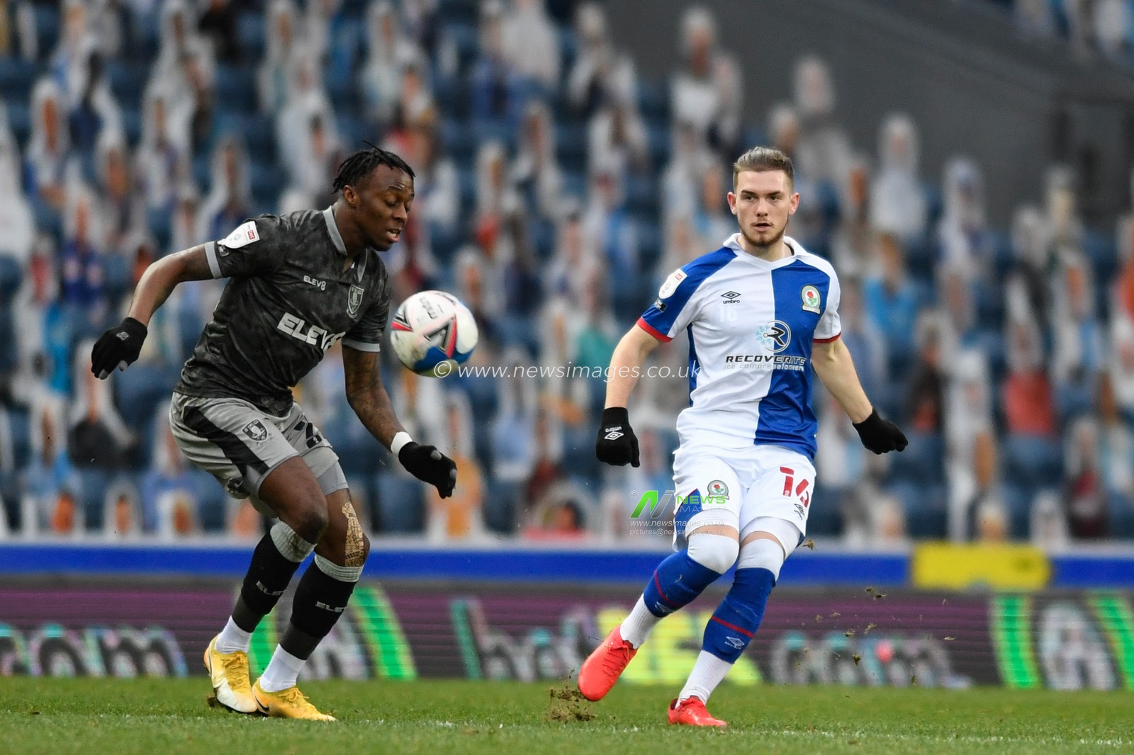 Harvey Elliott #16 of Blackburn Rovers passes the ball