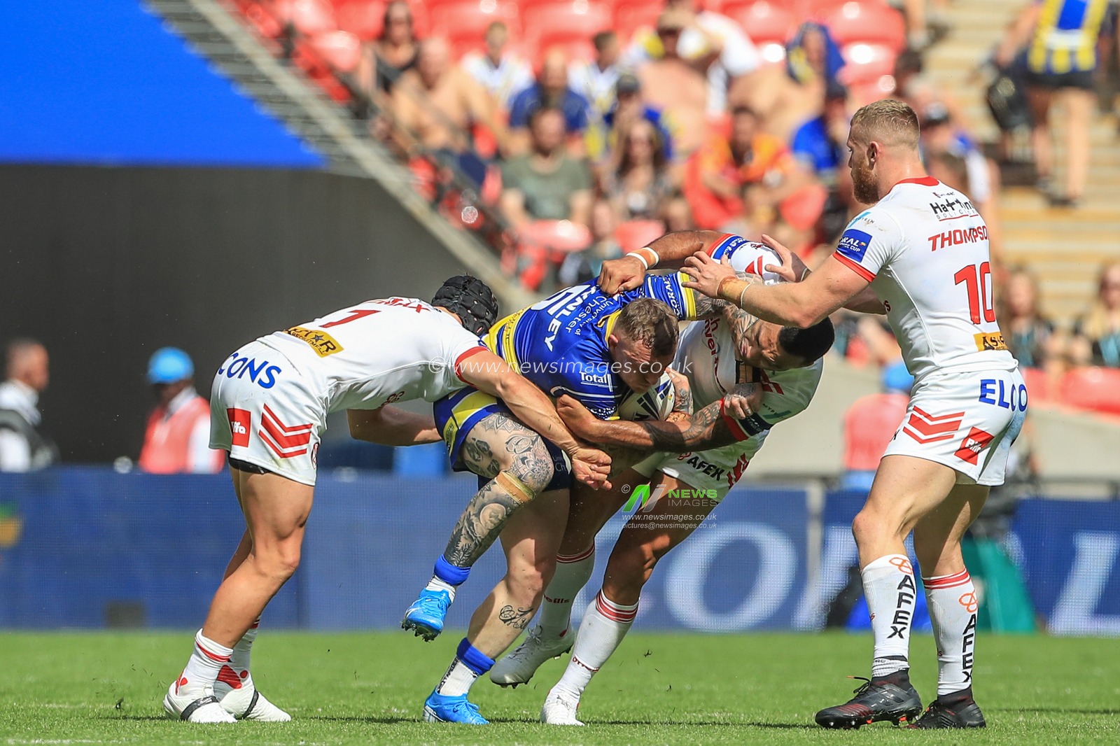 24th August 2019 , Wembley Stadium, London England ; 2019 Coral Challenge Cup Final ; St Helens vs Warrington Wolves ; Josh Charnley of Warrington Wolves is tackled 



Credit: Mark Cosgrove/News Images