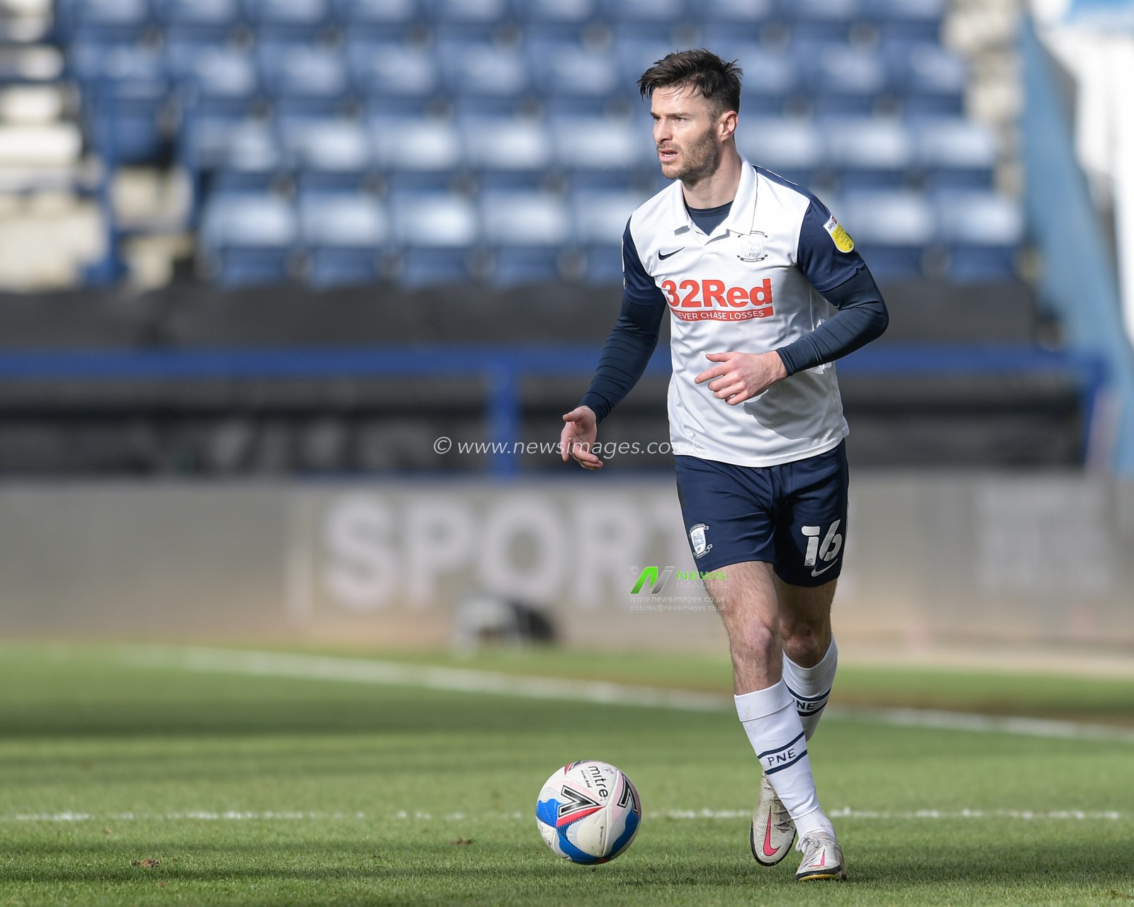 Andrew Hughes #16 of Preston North End runs with the ball