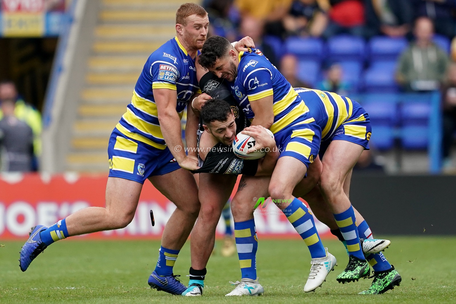 Hull FC's Jake Connor is tackled 


18th May 2019 , Halliwell Jones Stadium, Warrington, England;  Betfred Super League, Round 15, Warrington Wolves vs Hull FC ; 

Credit: Terry Donnelly/News Images