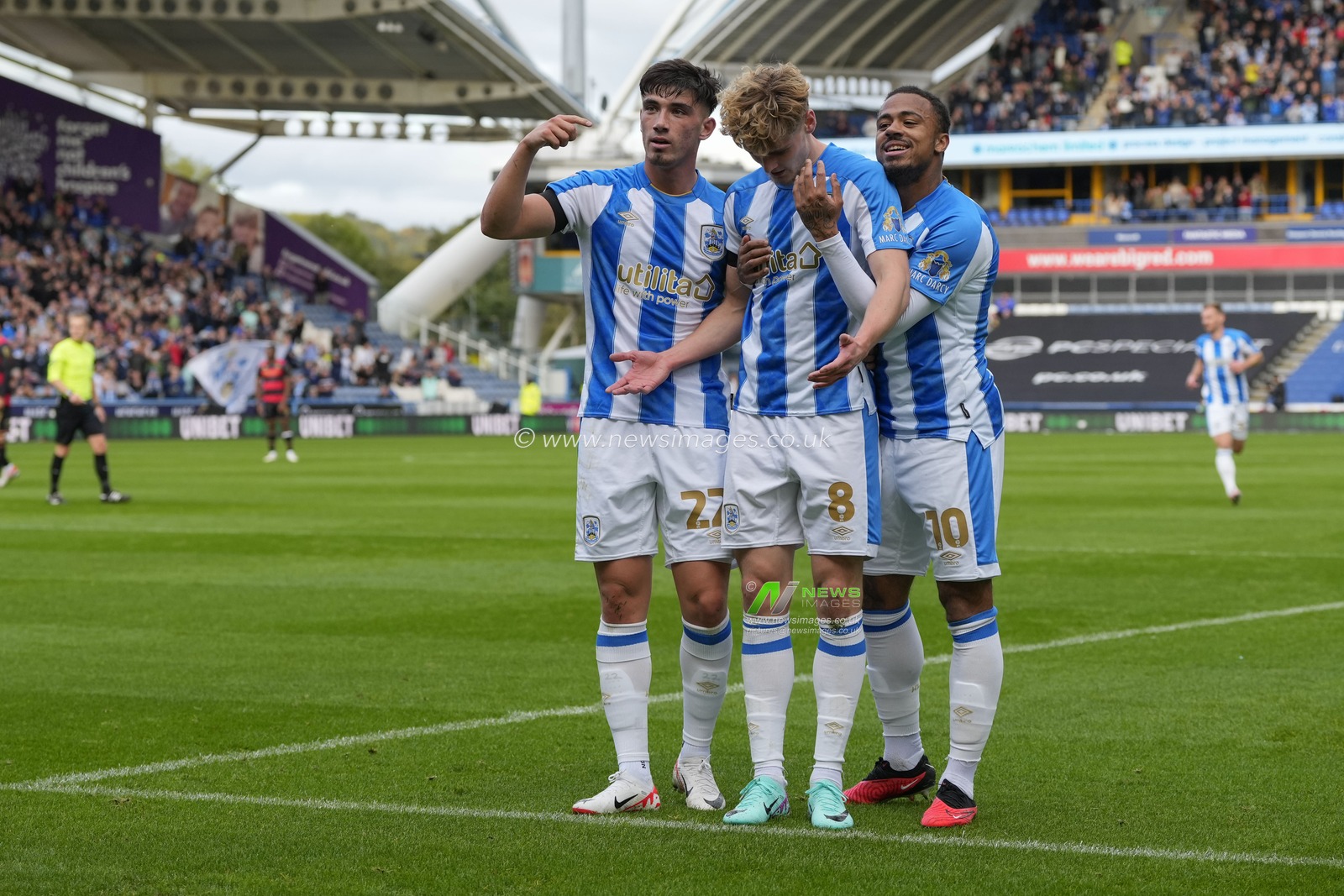 Jack Rudoni #8 of Huddersfield Town celebrates scoring to make it 2-0 during the Sky Bet Championship match Huddersfield Town vs Queens Park Rangers at John Smith's Stadium, Huddersfield, United Kingdom, 21st October 2023

(Photo by Steve Flynn/News Images)