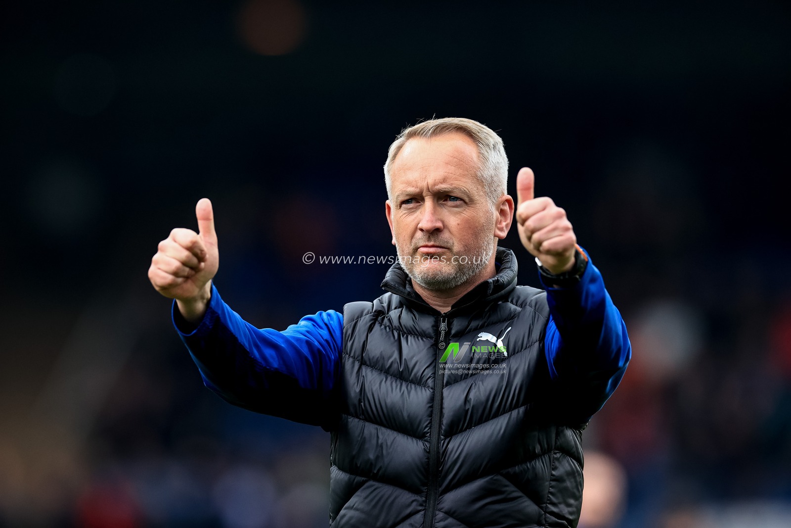 Neil Critchley head coach of Blackpool give the thumbs up to the traveling fans