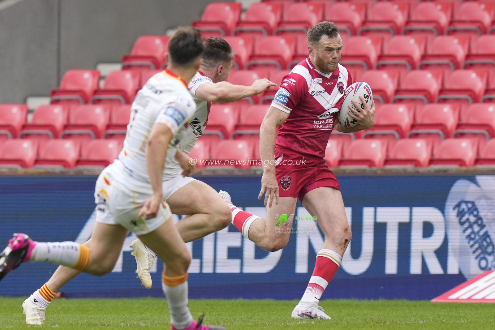 Joe Burgess #5 of Salford Red Devils makes a break during the Betfred Super League Round 10 match Salford Red Devils vs Catalans Dragons at AJ Bell Stadium, Eccles, United Kingdom, 23rd April 2023

(Photo by Steve Flynn/News Images)