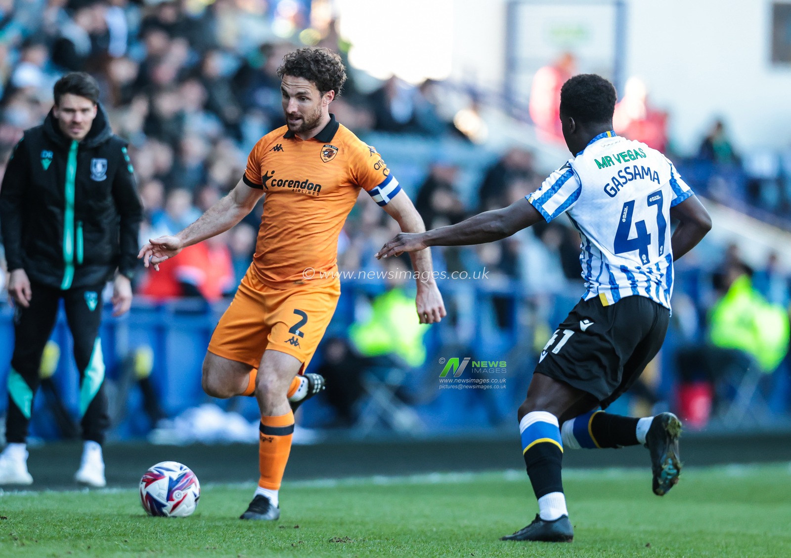 Lewis Coyle of Hull City and Djeidi Gassama of Sheffield Wednesday in action during the Sky Bet Championship match Sheffield Wednesday vs Hull City at Hillsborough, Sheffield, United Kingdom, 5th April 2025

(Photo by Richard Bierton/News Images)