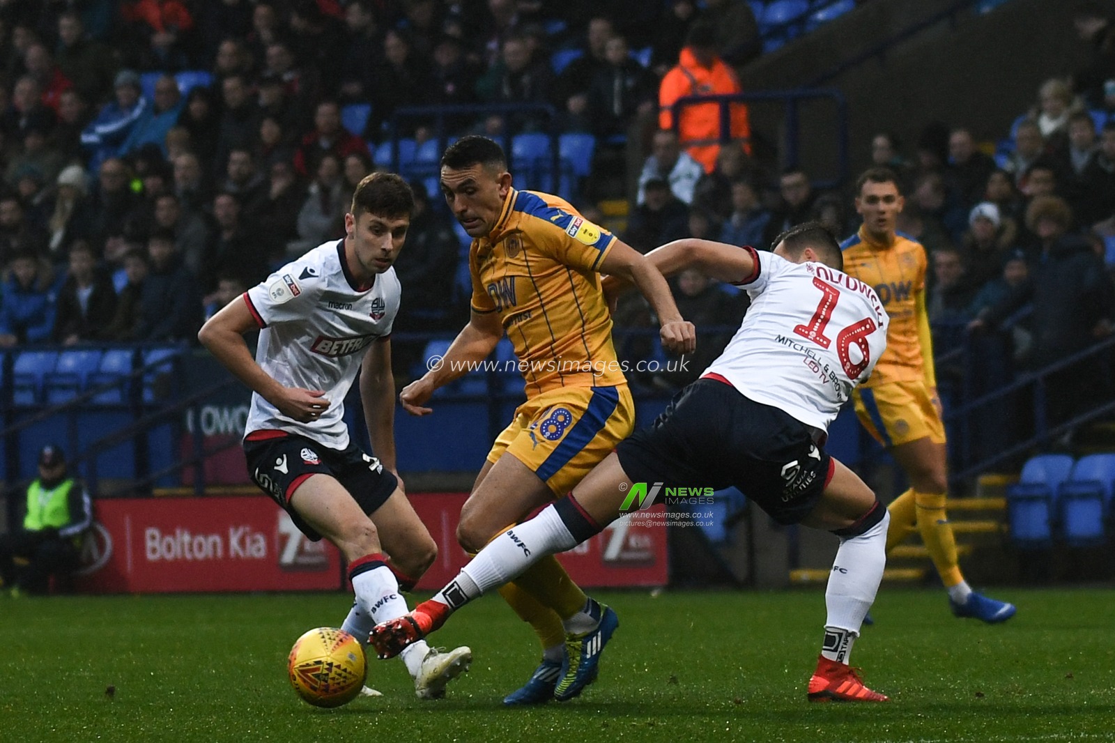 1st December 2018, University of Bolton Stadium, Bolton, England; Sky Bet Championship, Bolton v Wigan ; Gary Roberts of Wigan Athletic is tackled by Pawel Olkowski of Bolton Wanderers 


Credit: Richard Long/News Images

English Football League images are subject to DataCo Licence