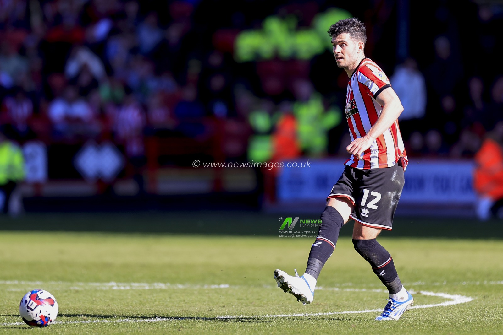 John Egan #12 of Sheffield United passes the ball during the Sky Bet Championship match Sheffield United vs Wigan Athletic at Bramall Lane, Sheffield, United Kingdom, 7th April 2023

(Photo by Conor Molloy/News Images)