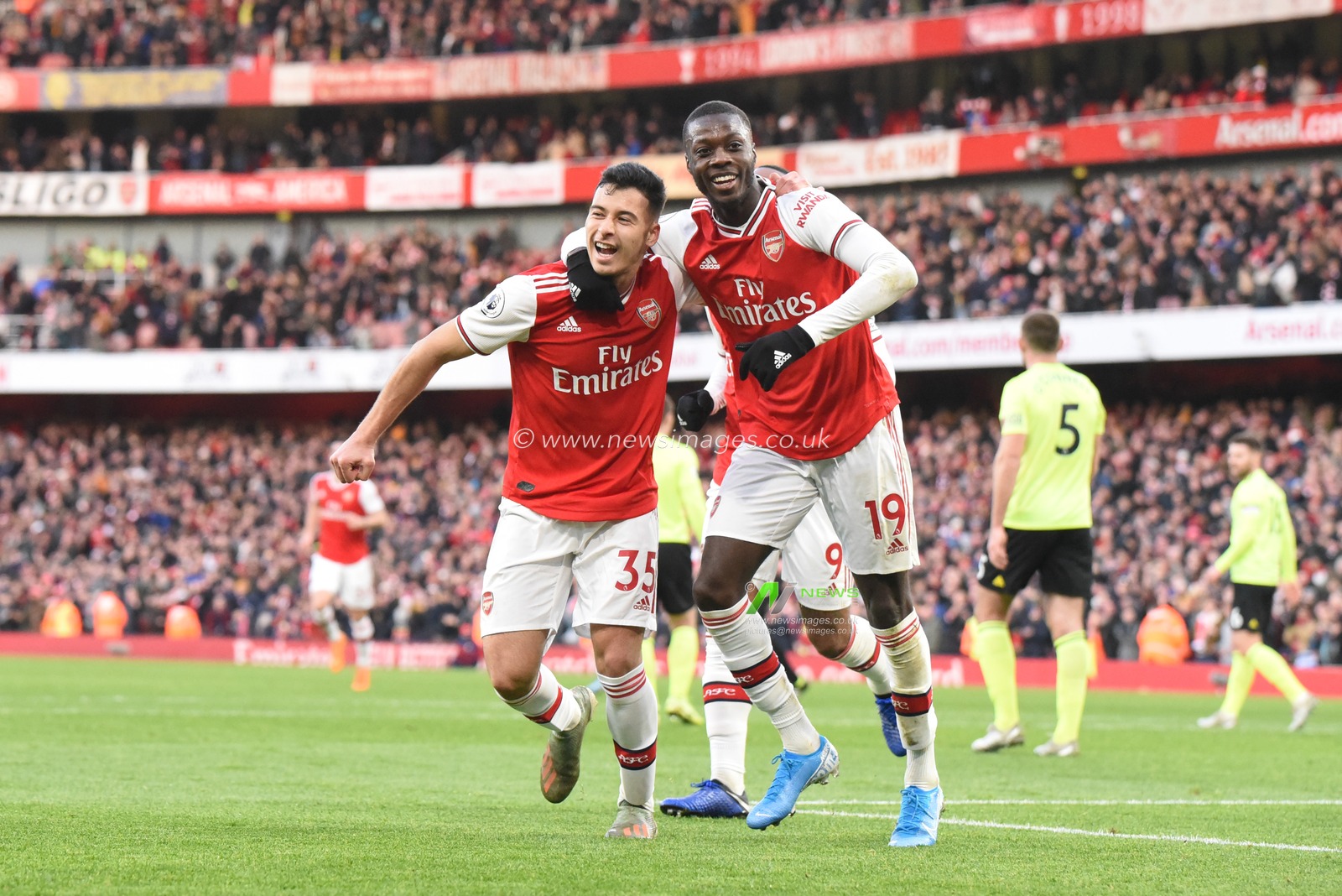 18th January 2020, Emirates Stadium, London, England; Premier League, Arsenal v Sheffield United : Gabriel Martinelli (35) of Arsenal celebrates scoring a goal with Nicolas Pepe (19) to make the score 1-0

Credit: Simon Whitehead/News Images