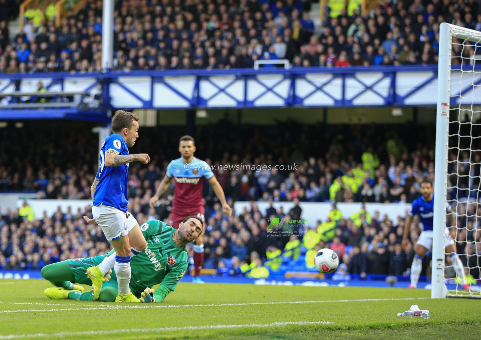 19th October 2019, Goodison Park, Liverpool, England; Premier League, Everton v West Ham United : Bernard (20) of Everton scores in the 17th minute, 1-0 to Everton

Credit: Conor Molloy/News Images