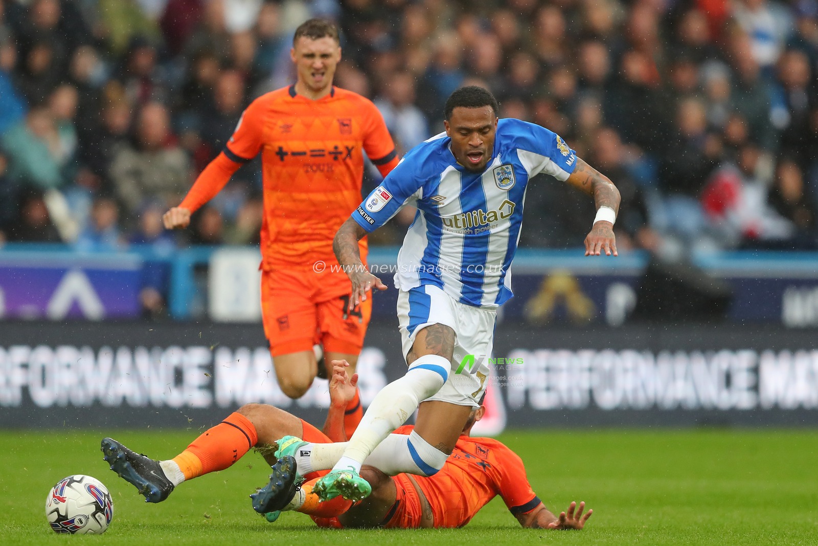 Massimo Luongo #25 of Ipswich Town tackles Delano Burgzorg #7 of Huddersfield Town during the Sky Bet Championship match Huddersfield Town vs Ipswich Town at John Smith's Stadium, Huddersfield, United Kingdom, 30th September 2023

(Photo by Gareth Evans/News Images)