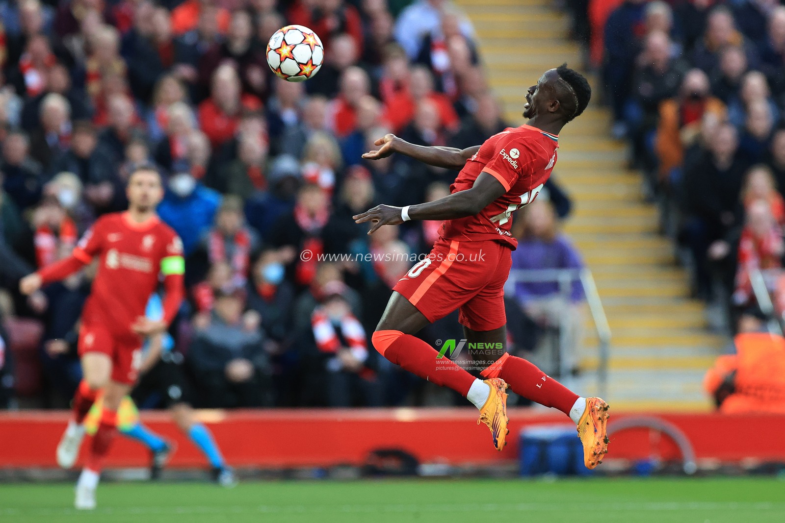 Sadio Mane #10 of Liverpool heads the ball towards goal
