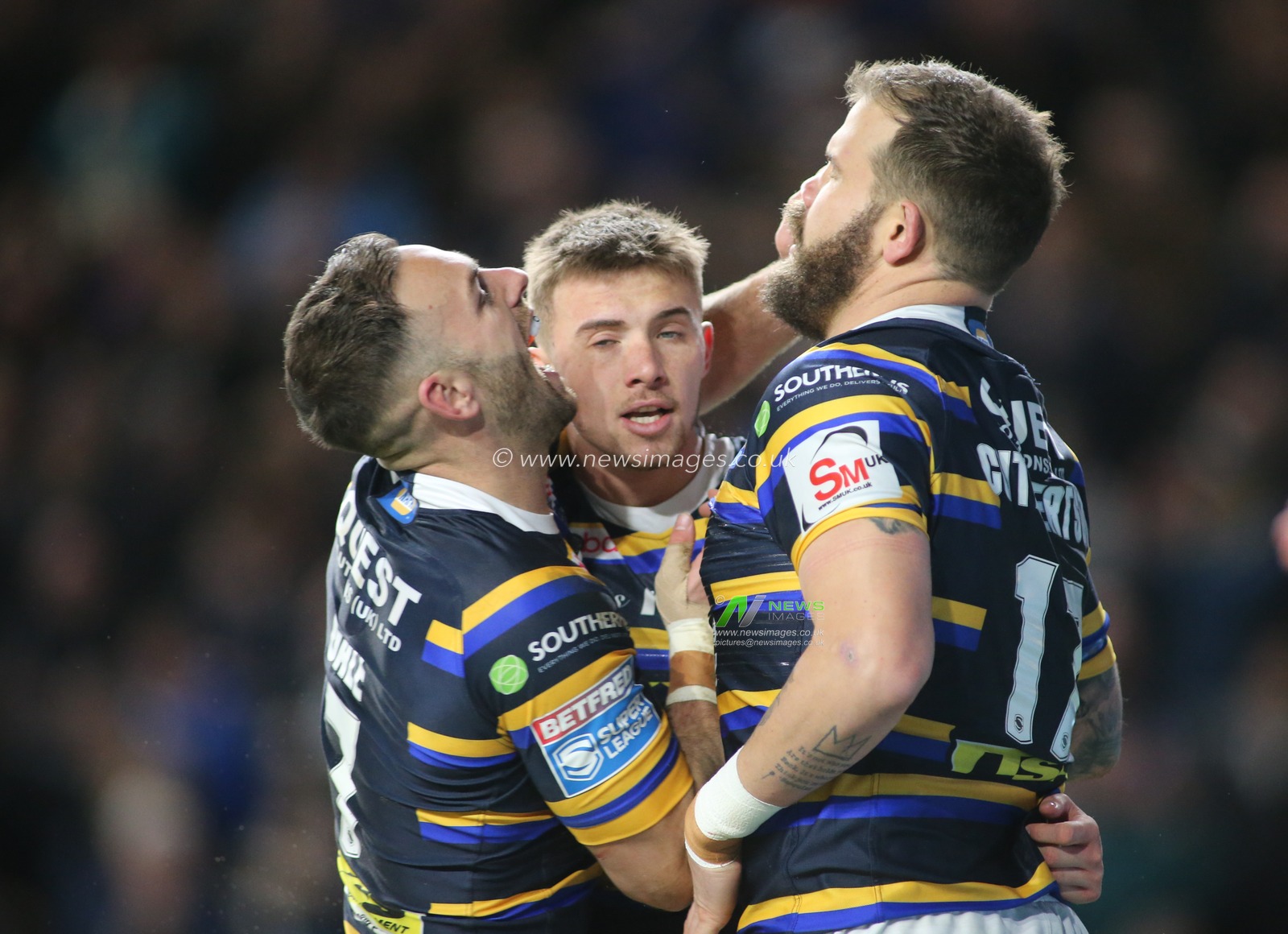 14th February 2020, Headingley Carnegie Stadium, Leeds, England; Betfred Super League, Leeds Rhinos v Hull Kingston Rovers : Jack Walker (C) of Leeds Rhinos celebrates scoring the try  with team mate Adam Cuthbertson (R) and Luke Gale (L) against Hull KR.