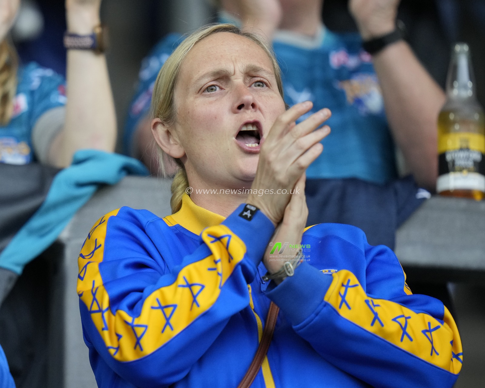 A Leeds Rhinos fan waits for the sides to come out for the warm up before the Betfred Super League Round 20 match St Helens vs Leeds Rhinos at Totally Wicked Stadium, St Helens, United Kingdom, 28th July 2023

(Photo by Steve Flynn/News Images)