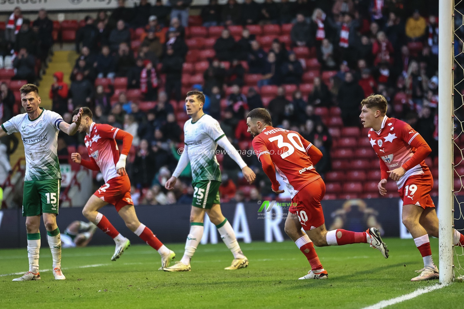 Adam Phillips of Barnsley scores to make it 1-4 during the Sky Bet League 1 match Barnsley vs Lincoln City at Oakwell, Barnsley, United Kingdom, 9th March 2024

(Photo by Mark Cosgrove/News Images)