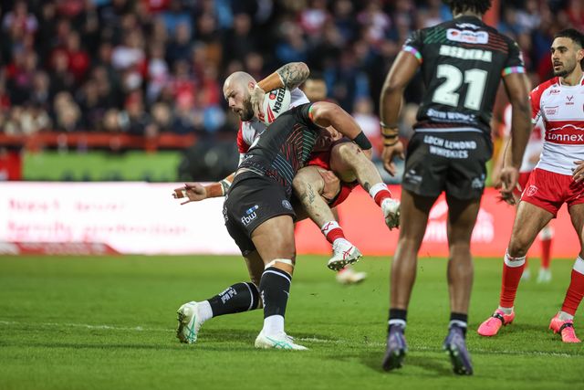 Sam Luckley of Hull KR is upended by Patrick Mago of Wigan Warriors during the Betfred Super League Round 9 match Hull KR vs Wigan Warriors at Sewell Group Craven Park, Kingston upon Hull, United Kingdom, 26th April 2024

(Photo by Mark Cosgrove/News Images)