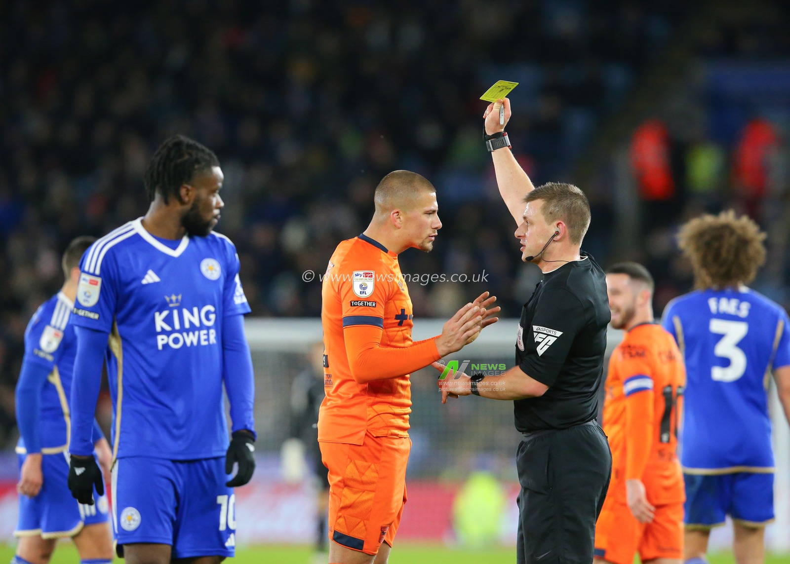 Referee Josh Smith gives Harry Clarke of Ipswich Town his first yellow card of the match, during the Sky Bet Championship match Leicester City vs Ipswich Town at King Power Stadium, Leicester, United Kingdom, 22nd January 2024

(Photo by Gareth Evans/News Images)