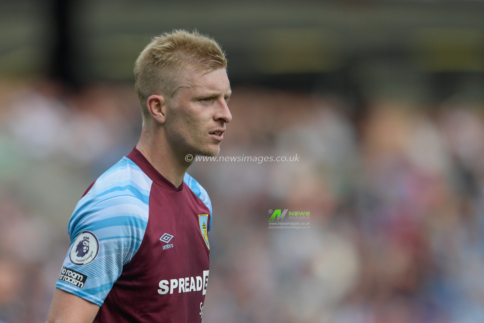 Ben Mee #6 of Burnley in action during the game