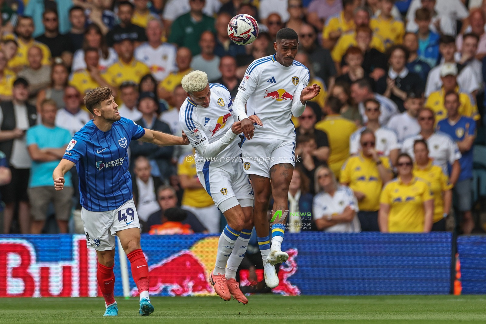 Ethan Ampadu of Leeds United and Junior Firpo of Leeds United clash as they go for the ball during the Sky Bet Championship match Leeds United vs Portsmouth at Elland Road, Leeds, United Kingdom, 10th August 2024

(Photo by Mark Cosgrove/News Images)