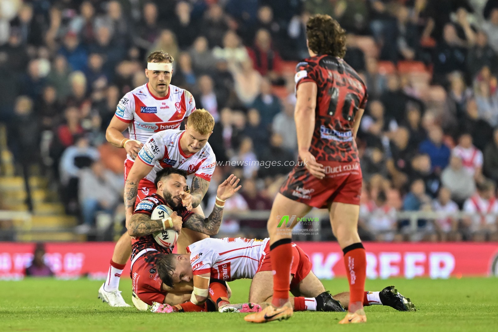 Gareth Oâ€™Brien of Leigh Leopards gets tackled during the Betfred Super League Round 27 match Leigh Leopards vs St Helens at Leigh Sports Village, Leigh, United Kingdom, 20th September 2024

(Photo by Cody Froggatt/News Images)