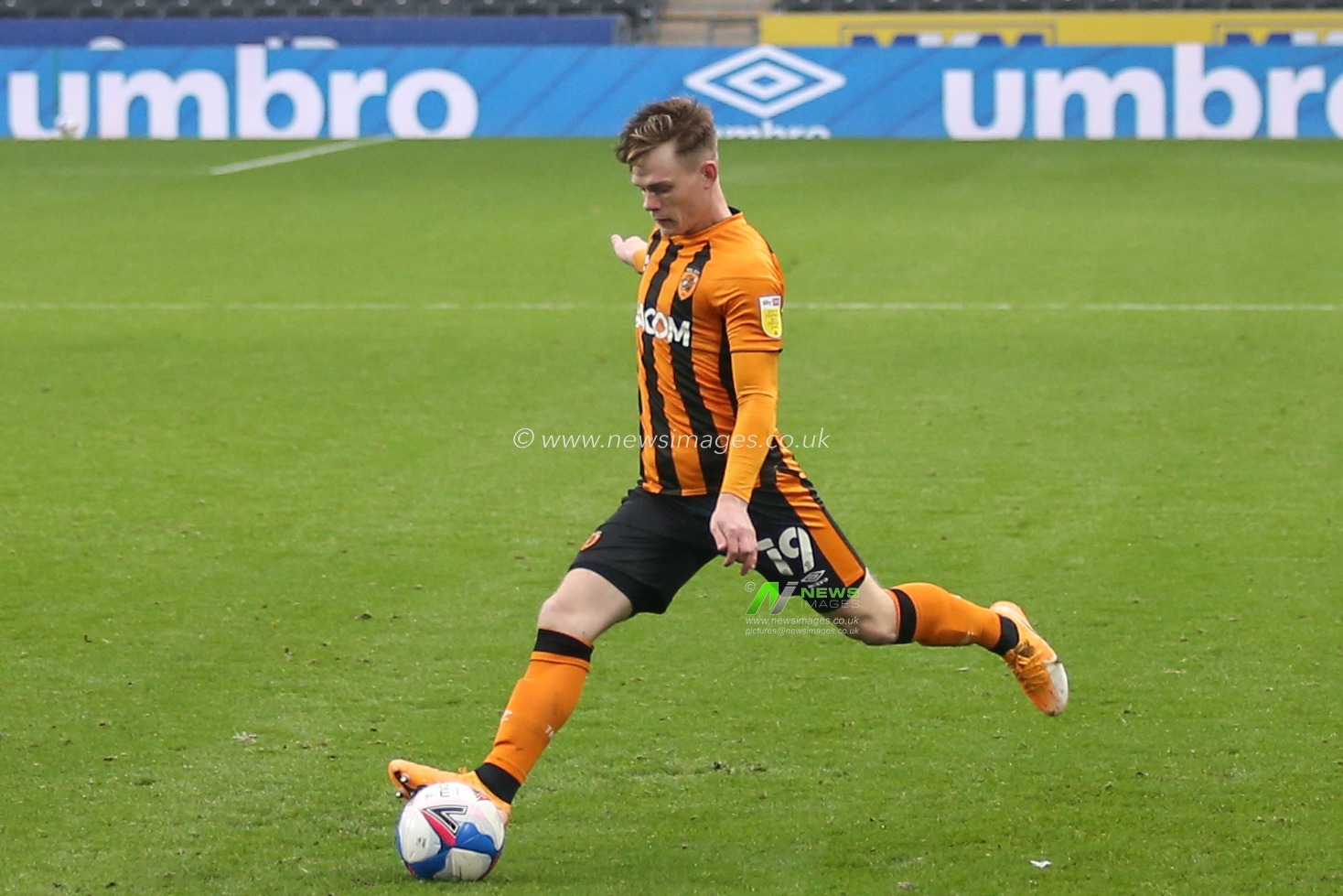 Keane Lewis-Potter (19) of Hull City prepares to kick the ball