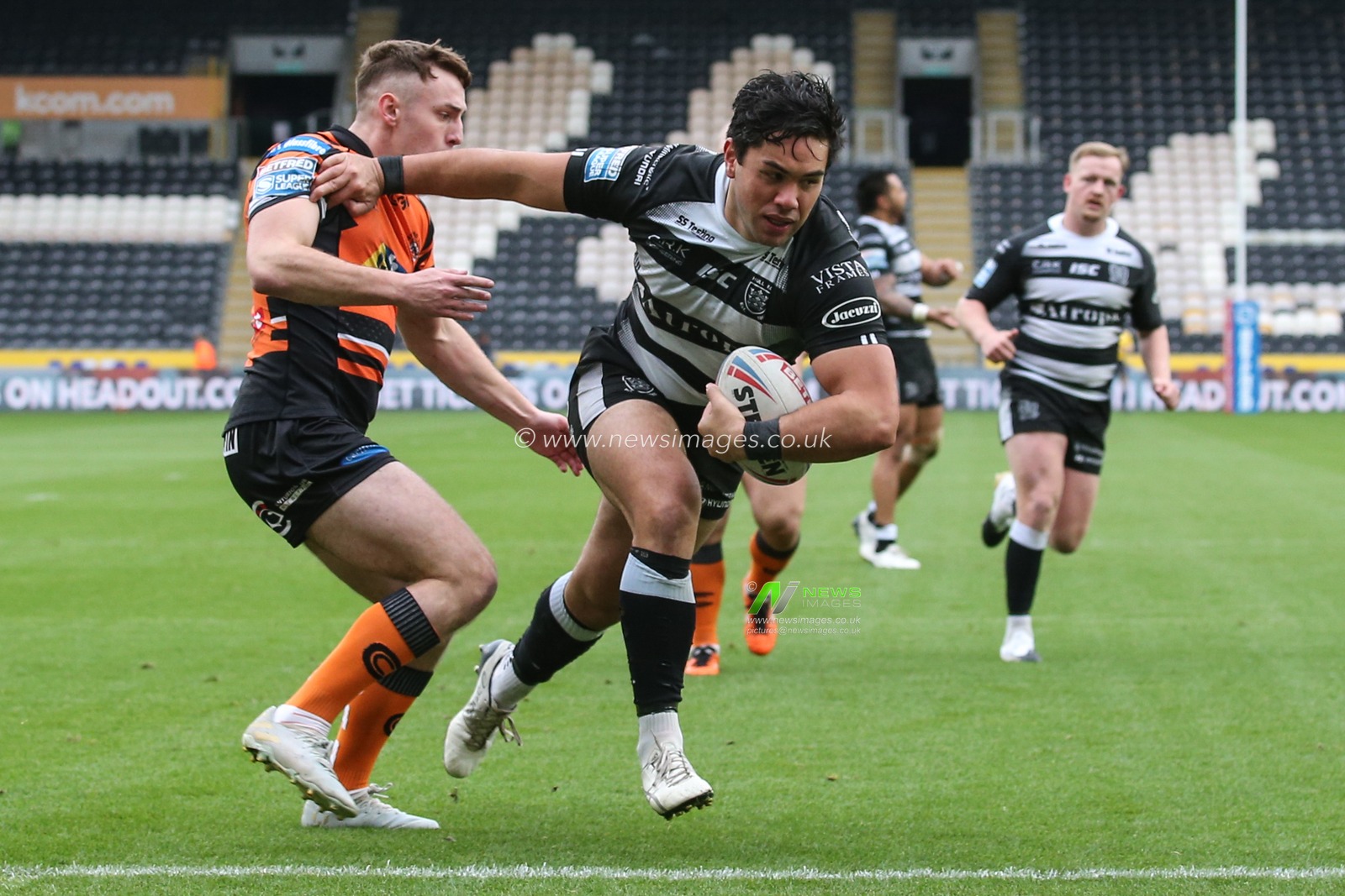 Andre Savelio (23) of Hull FC runs to the try line to score his try