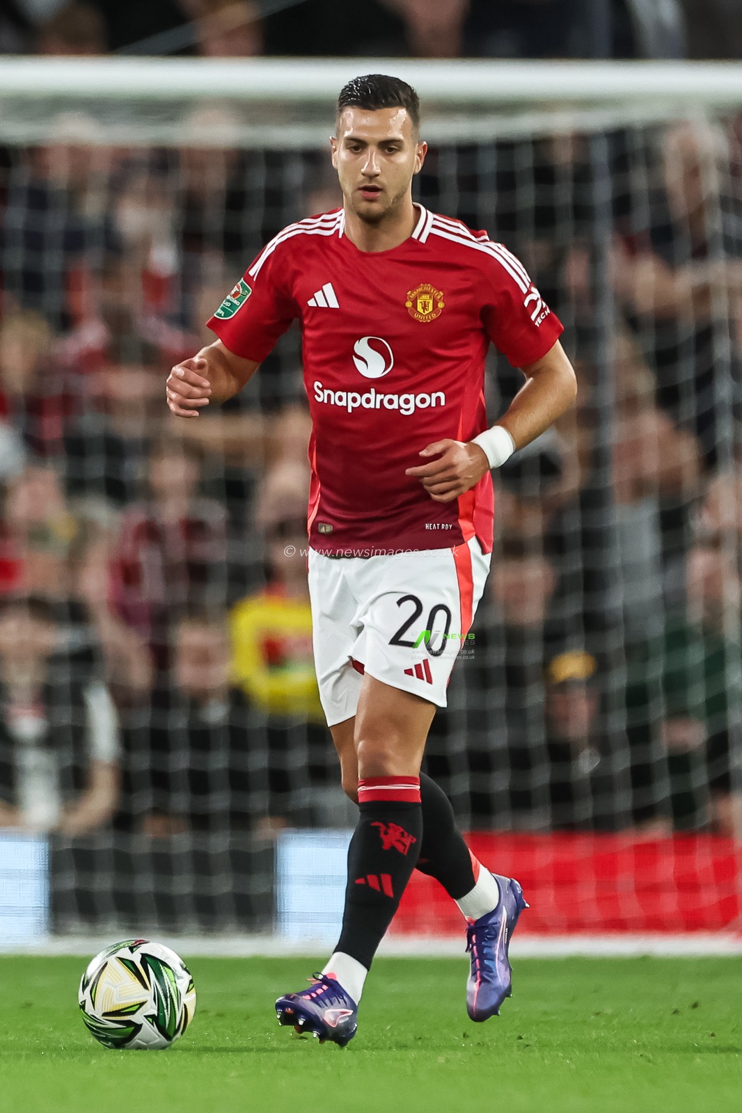Diogo Dalot of Manchester United in action during the Carabao Cup 3rd Round match Manchester United vs Barnsley at Old Trafford, Manchester, United Kingdom, 17th September 2024

(Photo by Mark Cosgrove/News Images)