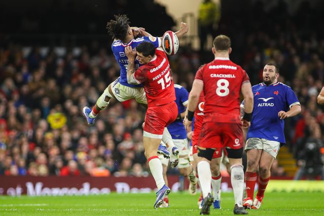 Louis Rees-Zammit of Wales and Theo Attissogbe of France jump for the ball during the Guinness Six Nations match Wales vs France at Principality Stadium, Cardiff, United Kingdom, 15th February 2026

(Photo by Andrew Lewis/News Images)