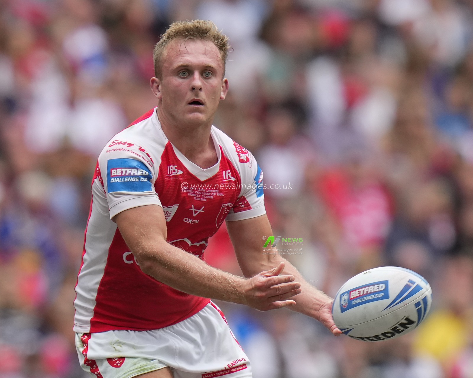 Jez Litten #14 of Hull KR passes the ball during the Betfred Challenge Cup match Hull KR vs Leigh Leopards at Wembley Stadium, London, United Kingdom, 12th August 2023

(Photo by Steve Flynn/News Images)
