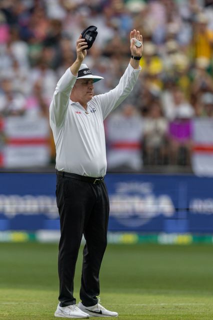 On-field Umpire signals a six during the NRMA Insurance Ashes First Test Day 2 Australia vs England at Optus Stadium, Perth, Australia, 22nd November 2025

(Photo by Santanu Banik/News Images)

*** GER AUT SUI OUT ***