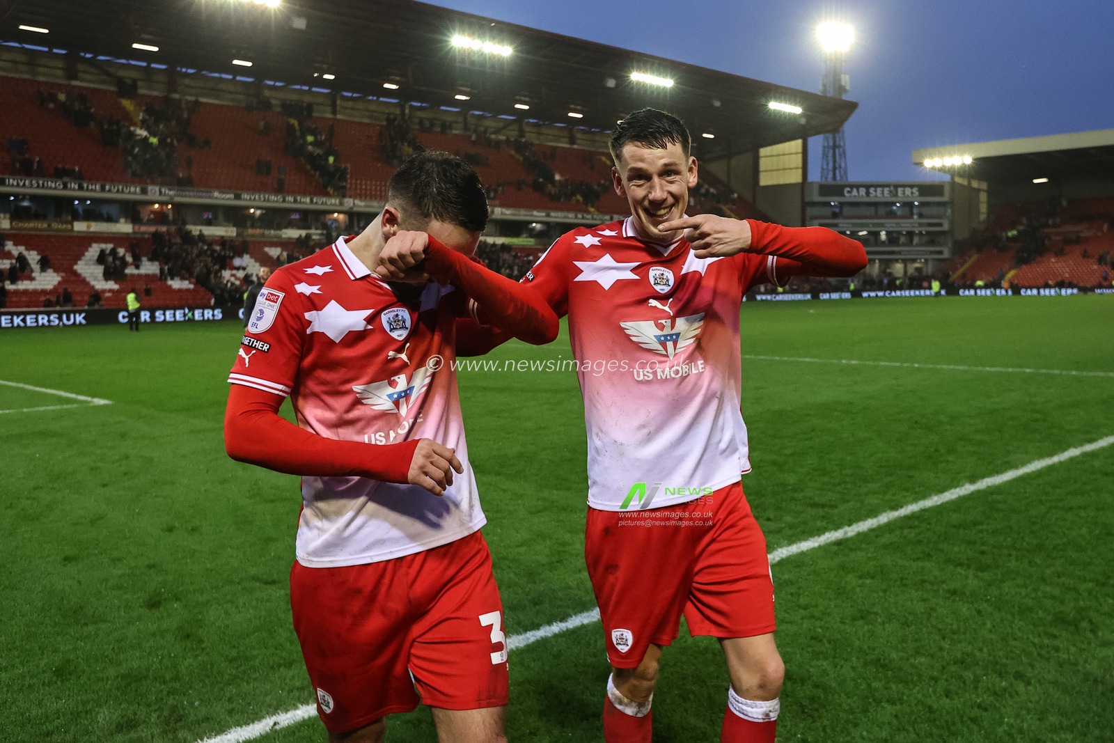 MaÃ«l de Gevigney of Barnsley points to double goal scorer Adam Phillips of Barnsley after the Reds win 2-1 during the Sky Bet League 1 match Barnsley vs Leyton Orient at Oakwell, Barnsley, United Kingdom, 10th February 2024

(Photo by Mark Cosgrove/News Images)