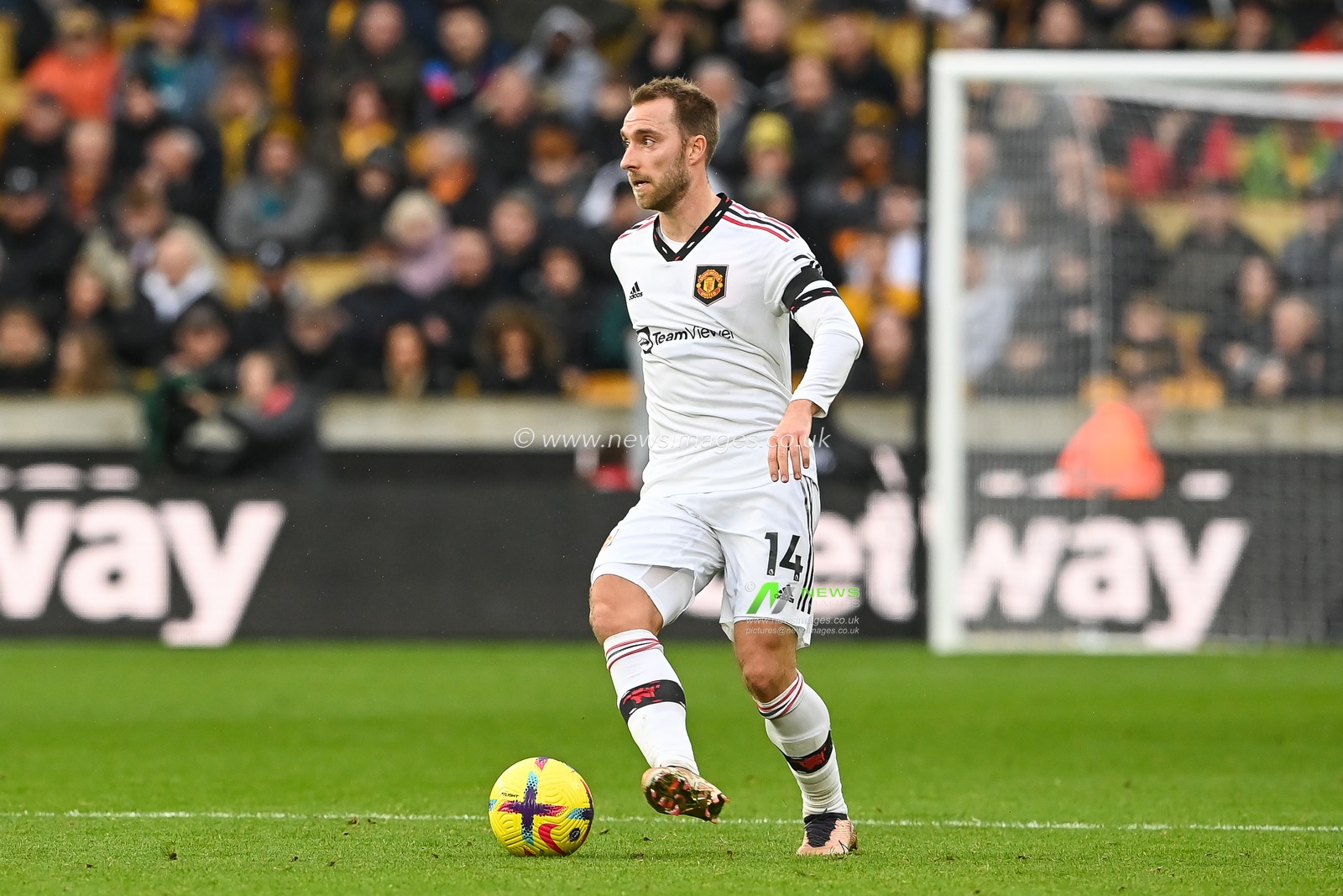 Christian Eriksen #14 of Manchester United in action during the Premier League match Wolverhampton Wanderers vs Manchester United at Molineux, Wolverhampton, United Kingdom, 31st December 2022

(Photo by Craig Thomas/News Images)