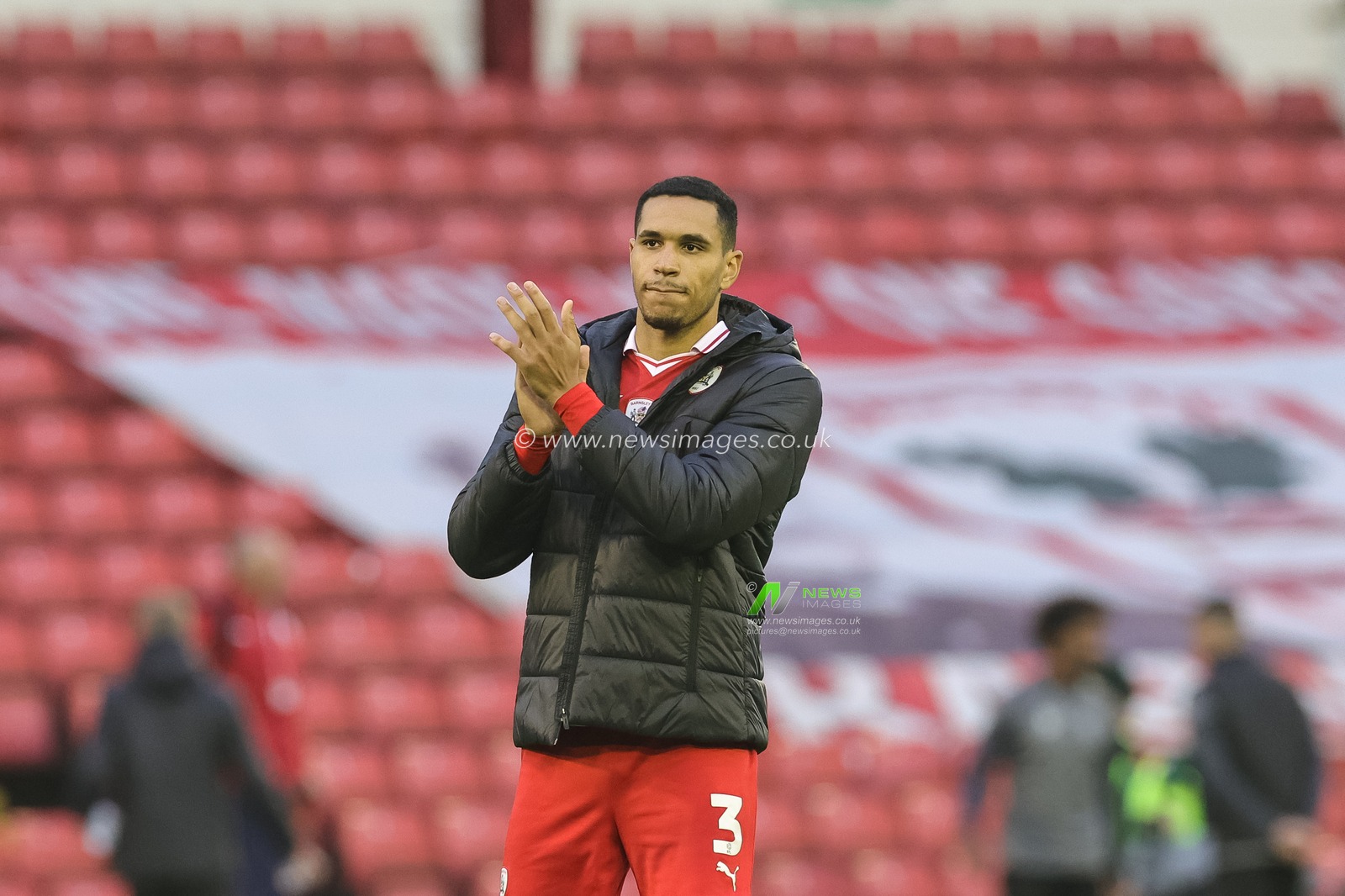 Jon Russell #3 of Barnsley applauds the home fans during the Sky Bet League 1 match Barnsley vs Fleetwood Town at Oakwell, Barnsley, United Kingdom, 28th October 2023

(Photo by Mark Cosgrove/News Images)