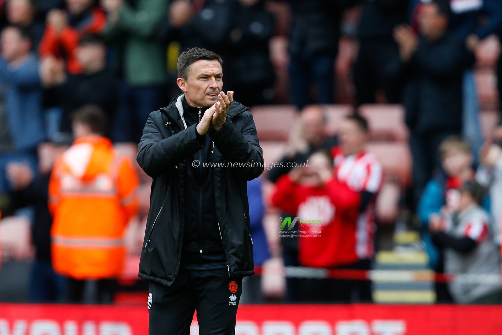 Paul Heckingbottom manager of Sheffield United applauds fans after the Sky Bet Championship match Sheffield United vs Cardiff City at Bramall Lane, Sheffield, United Kingdom, 15th April 2023

(Photo by Ben Early/News Images)