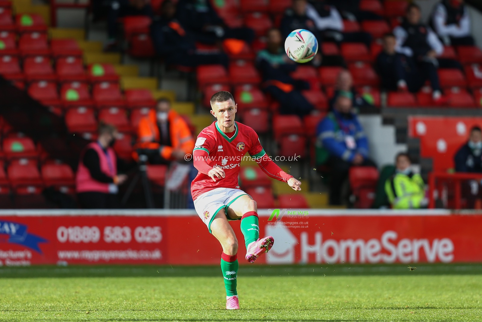 George Nurse (21) of Walsall crosses the ball