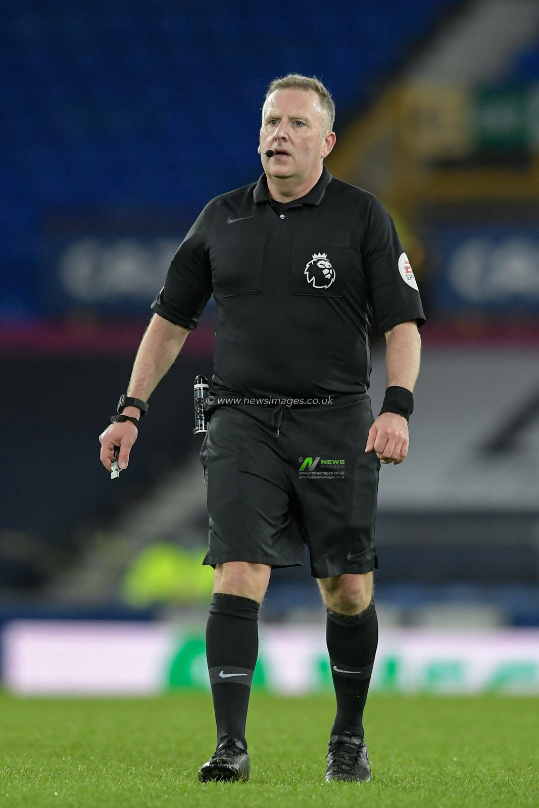 Referee Jonathan Moss in action during the game