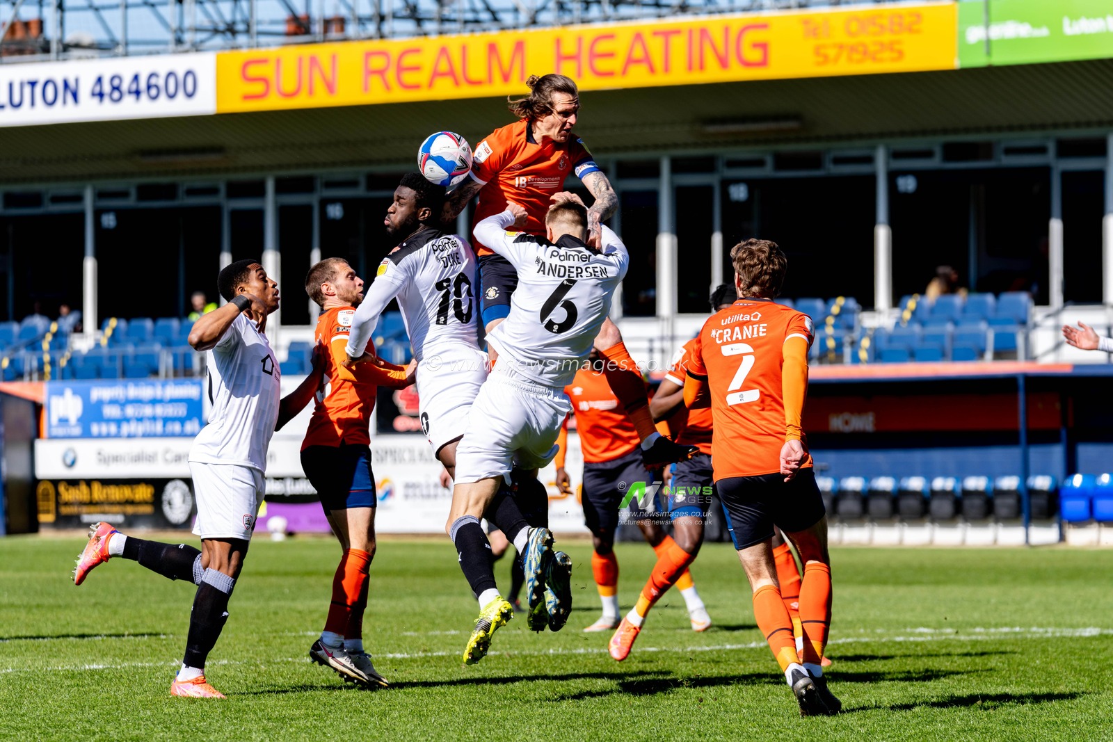 Daryl Dike #10 of Barnsley battles for the ball