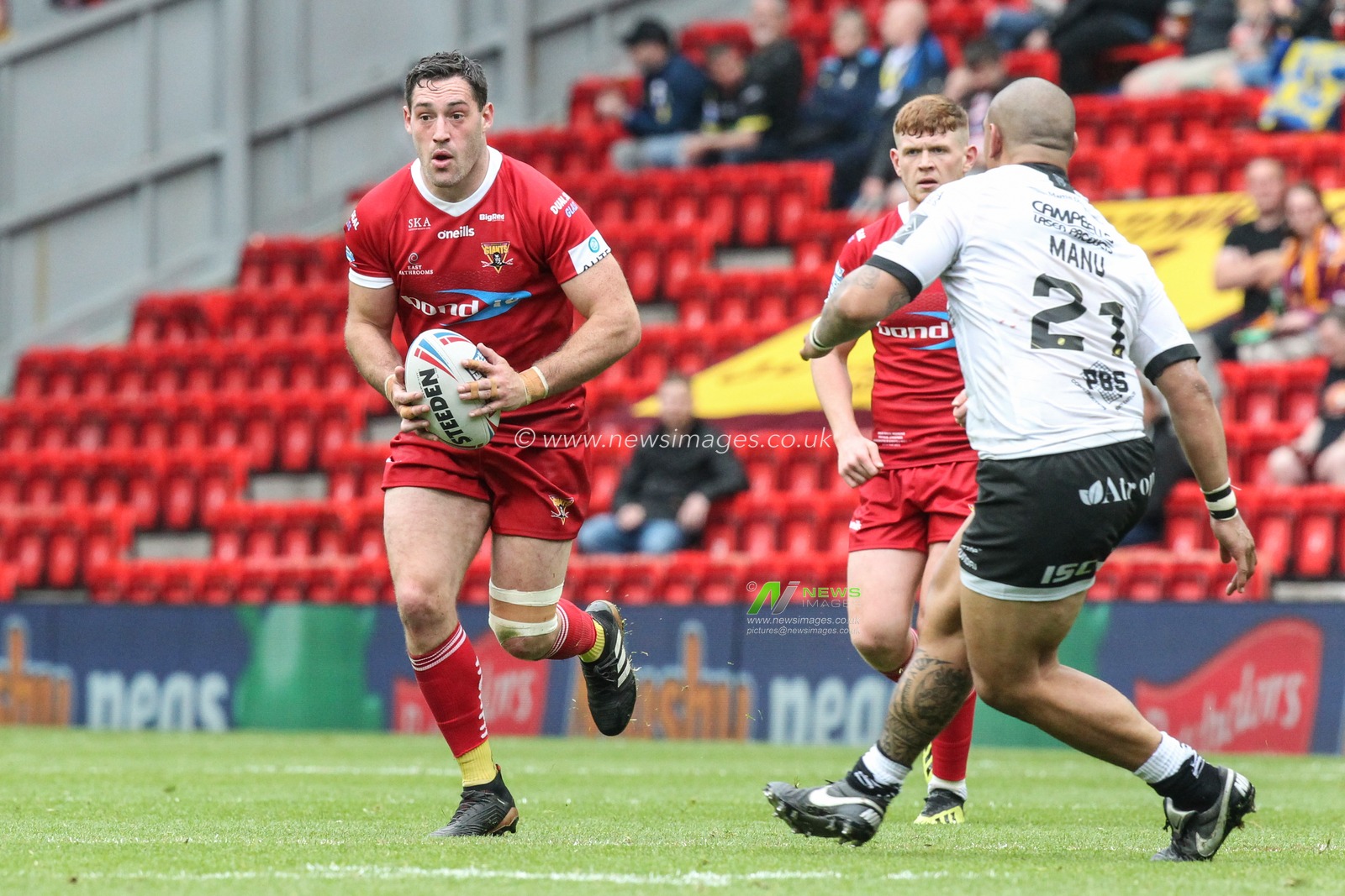 25th May 2019 , Anfield Stadium, Liverpool, England; Dacia Magic Weekend, Betfred Super League Round 16, Hull FC vs Huddersfield Giants ; Joe Wardle  (35) of Huddersfield Giants runs with the ball

Credit: David Greaves/News Images