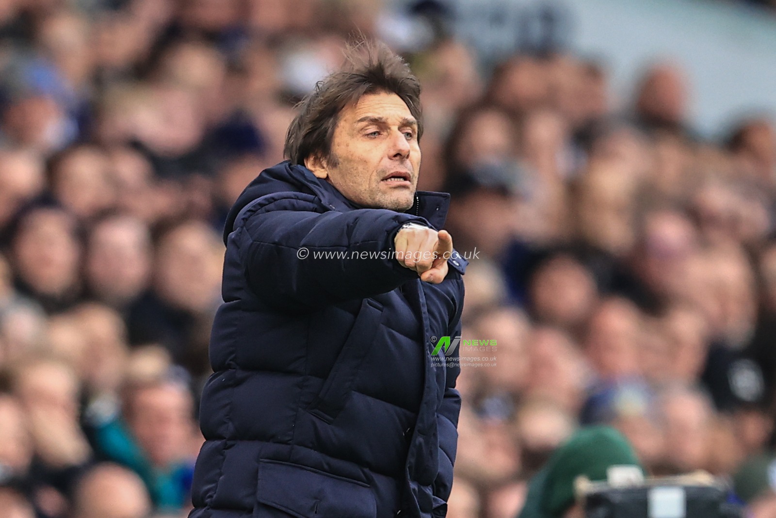 Antonio Conte manager of Tottenham Hotspur gives his team instructions