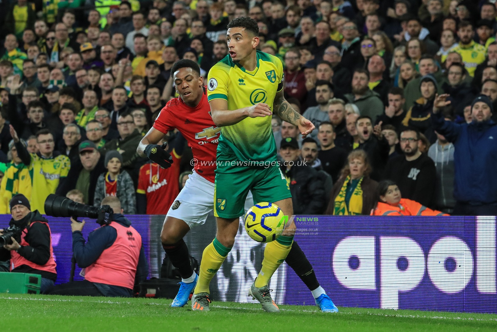 27th October 2019, Carrow Road, Norwich, England; Premier League, Norwich City v Manchester United : Ben Godfrey (4) of Norwich City wins the ball from Anthony Martial (9) of Manchester United 

Credit: Mark Cosgrove/News Images