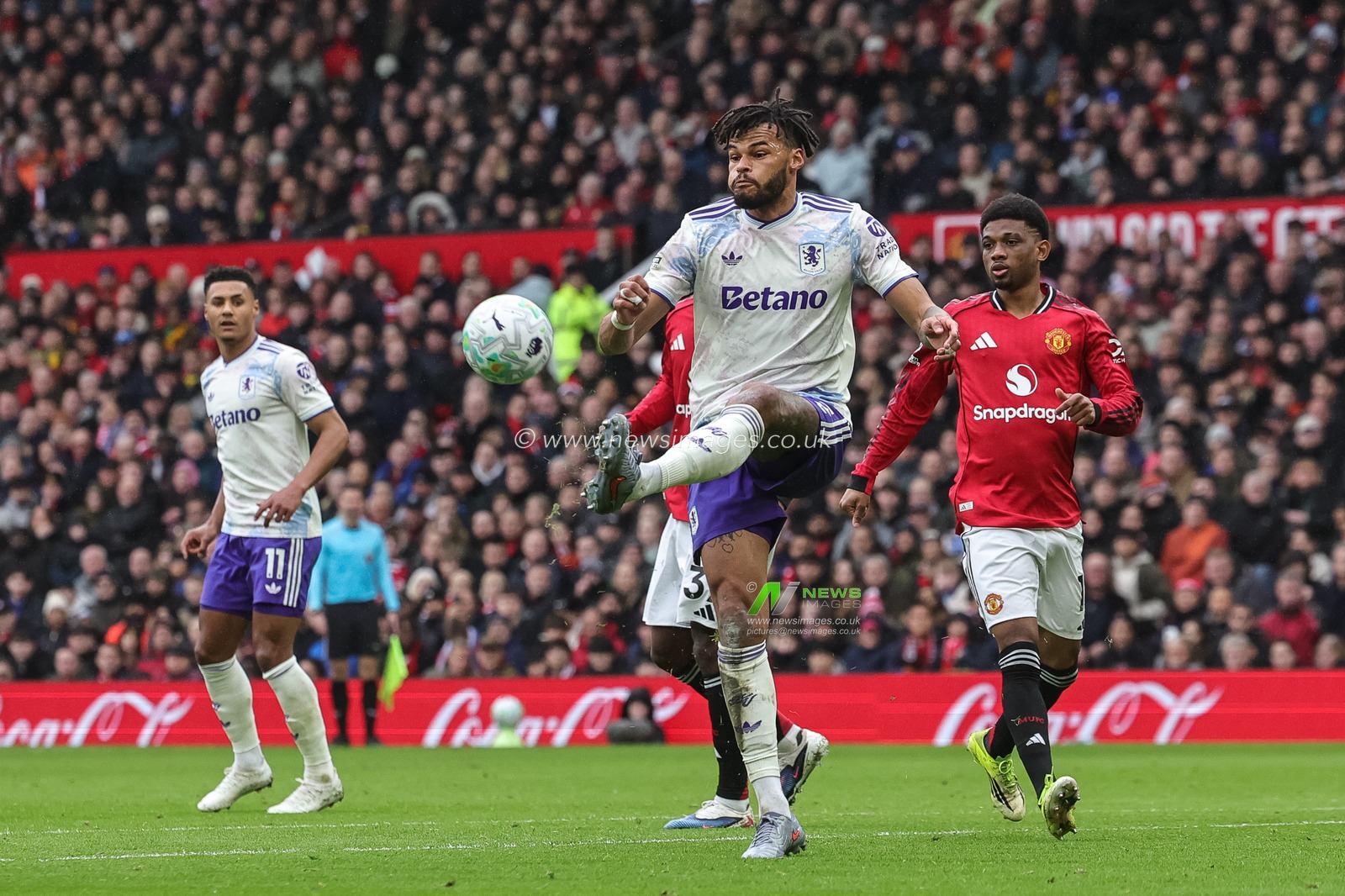 Tyrone Mings of Aston Villa clears the ball up field during the Premier League match Manchester United vs Aston Villa at Old Trafford, Manchester, United Kingdom on 15 March 2026

(Photo by Mark Cosgrove/News Images)