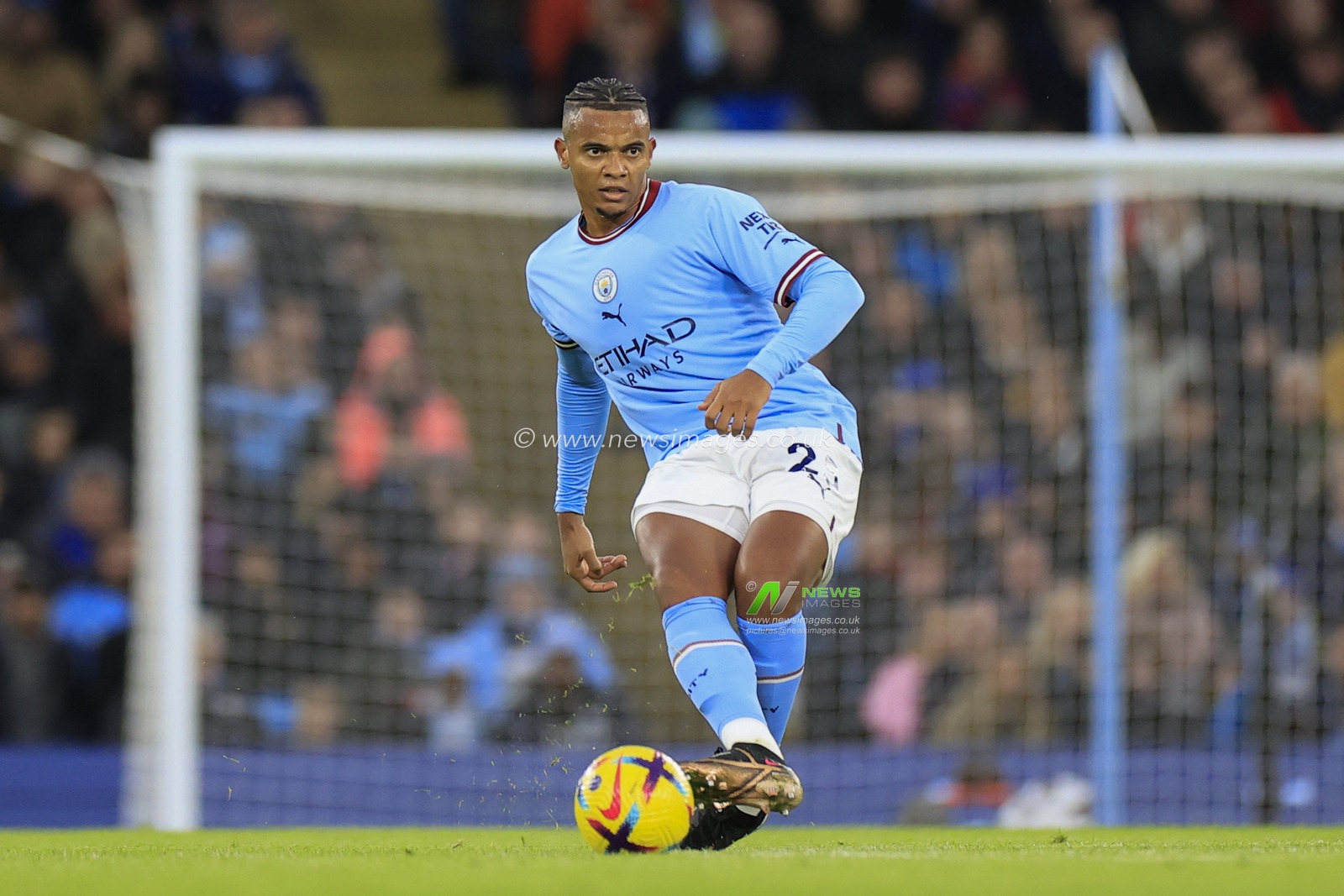 Manuel Akanji #25 of Manchester City passes the ball during the Premier League match Manchester City vs Everton at Etihad Stadium, Manchester, United Kingdom, 31st December 2022

(Photo by Conor Molloy/News Images)