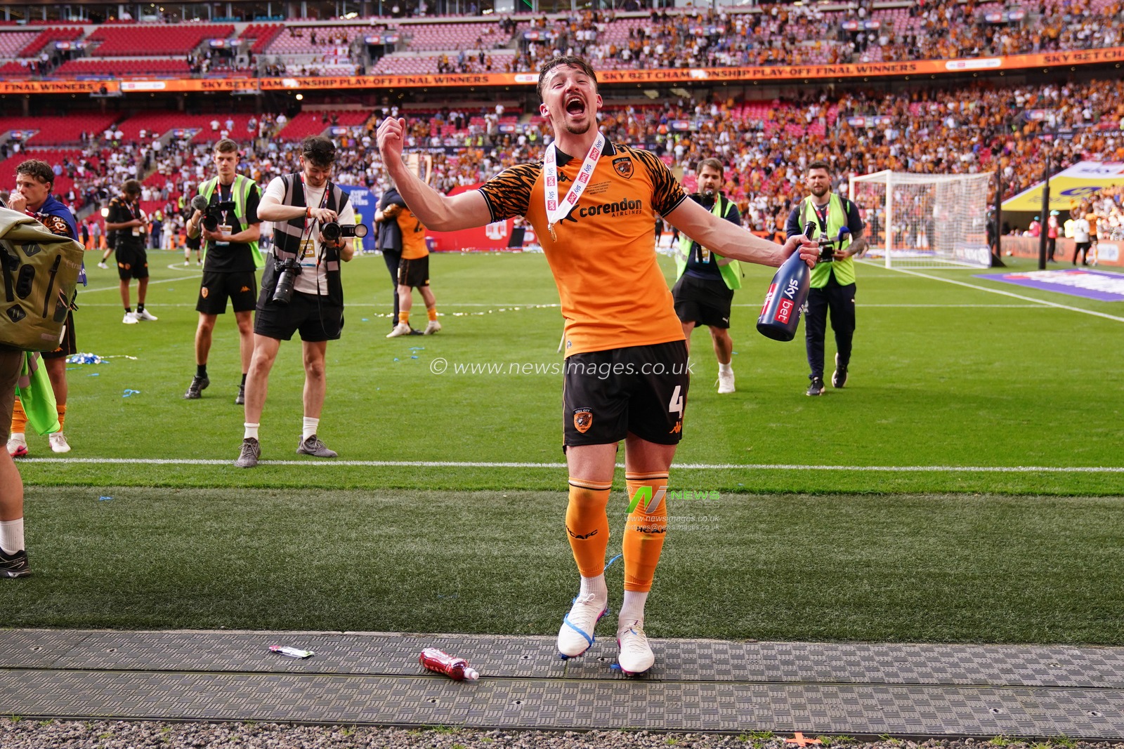 Charlie Hughes of Hull City celebrates promotion during the Sky Bet Championship Playoffs Final match Hull City vs Middlesbrough at Wembley Stadium, London, United Kingdom on 23 May 2026

(Photo by Harvey Murphy/News Images)