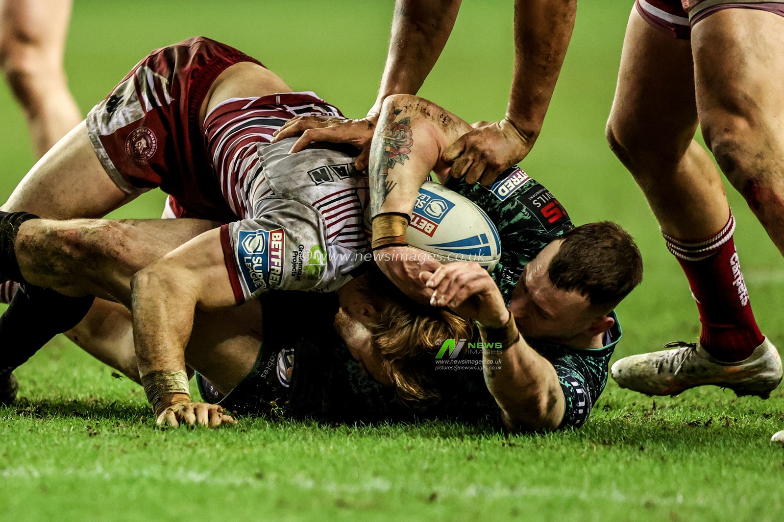 Frankie Halton of Leigh Leopards is tackled by ,Adam Keighran during the Betfred Super League match Wigan Warriors vs Leigh Leopards at The Brick Community Stadium, Wigan, United Kingdom on 26 February 2026

(Photo by Alfie Cosgrove/News Images)