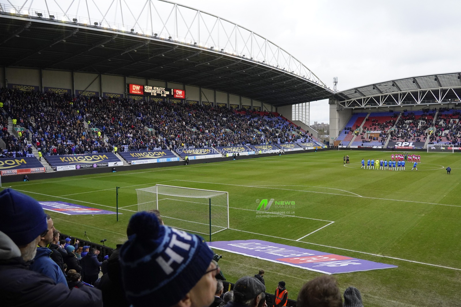 Players and fans hold a minutes silence as a mark of respect to the victims of the recent earthquake in Turkey and Syria during the Sky Bet Championship match Wigan Athletic vs Huddersfield Town at DW Stadium, Wigan, United Kingdom, 11th February 2023

(Photo by Steve Flynn/News Images)