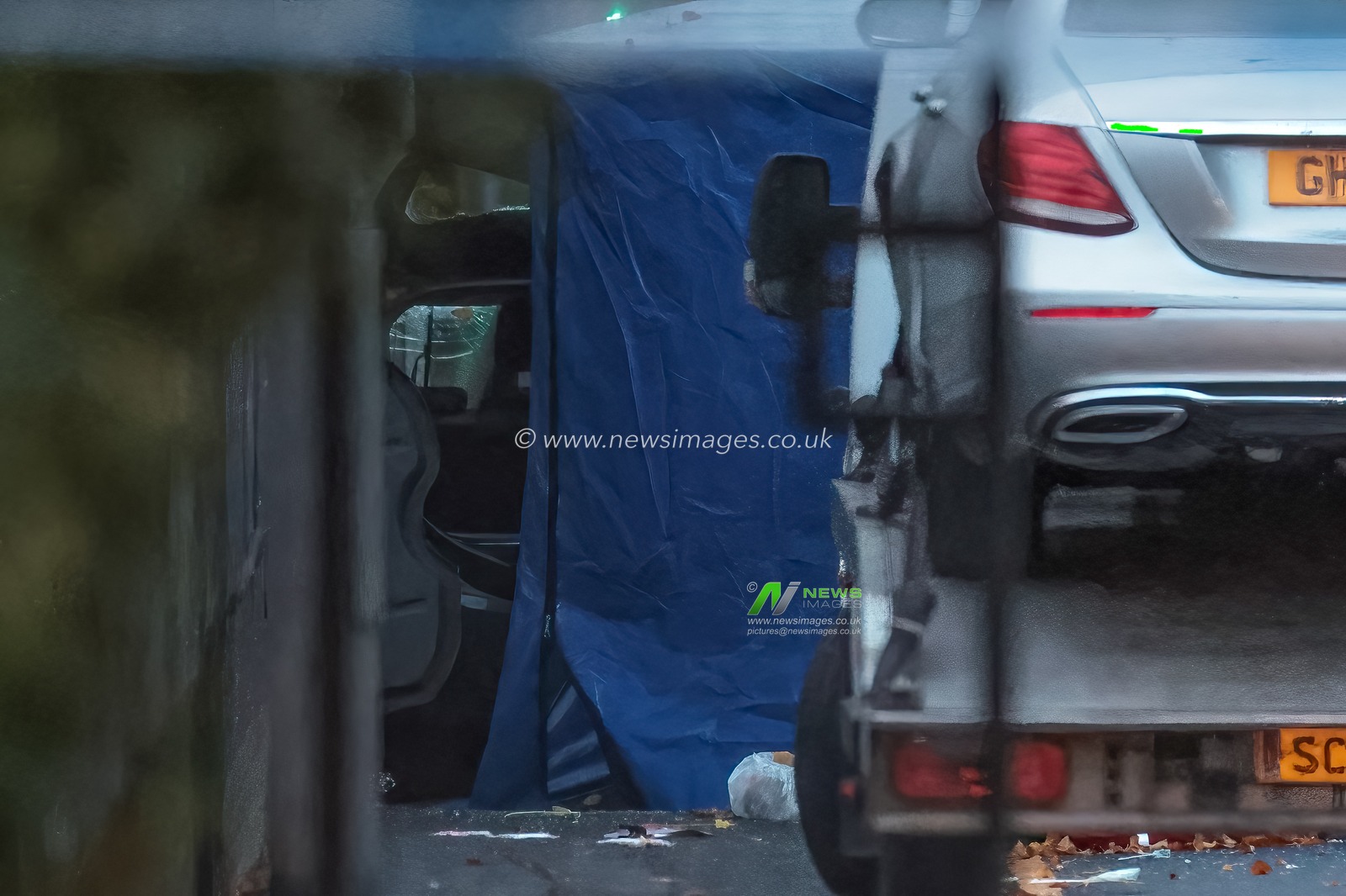 The open boot of a car with smashed windows is covered by a forensic tent during the Manchester synagogue terror attack day 2 at Heaton Park Shul, Manchester, United Kingdom, 3rd October 2025

(Photo by Mark Cosgrove/News Images)